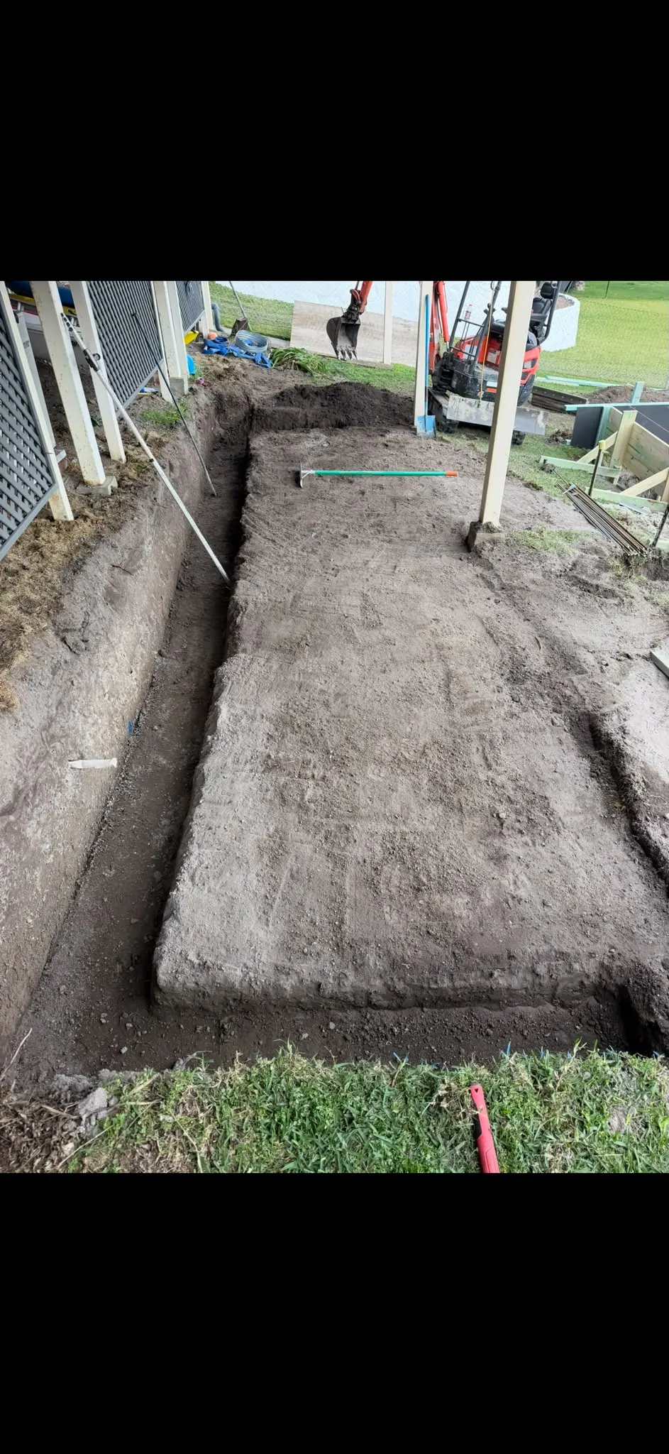 Footing channels beside a raised house