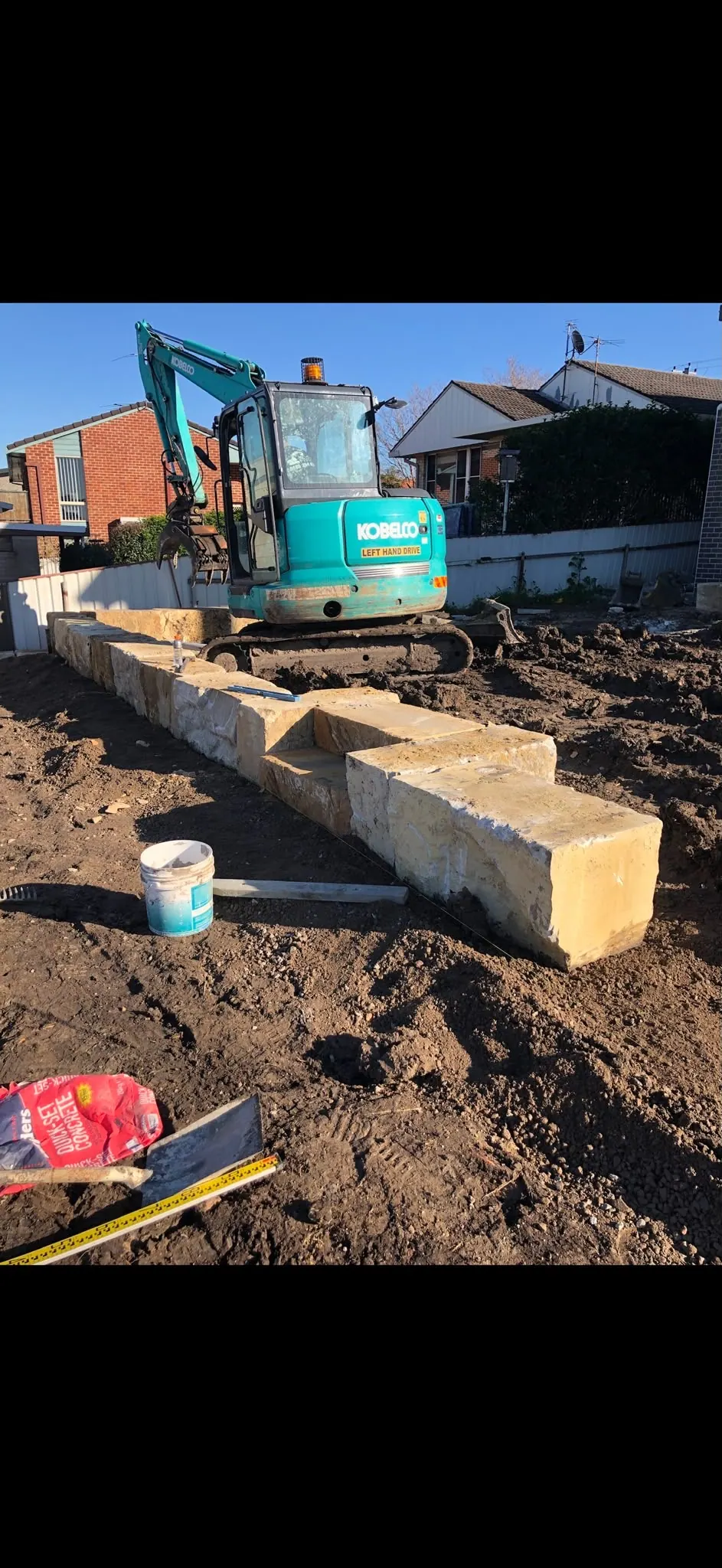 Sandstone blocks and landscape earthworks