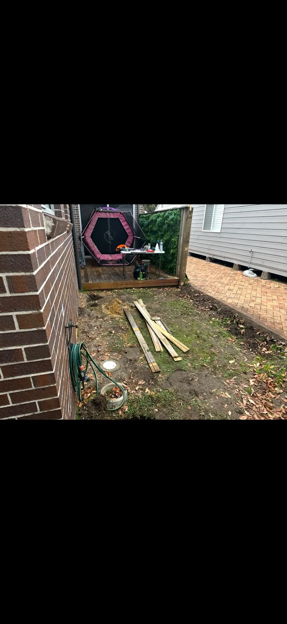 Compact residential yard before excavation