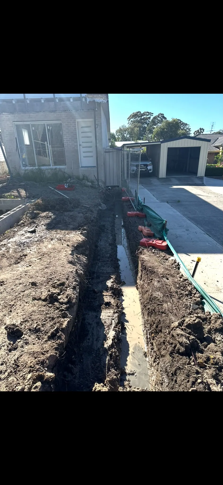 Residential trench alongside a boundary