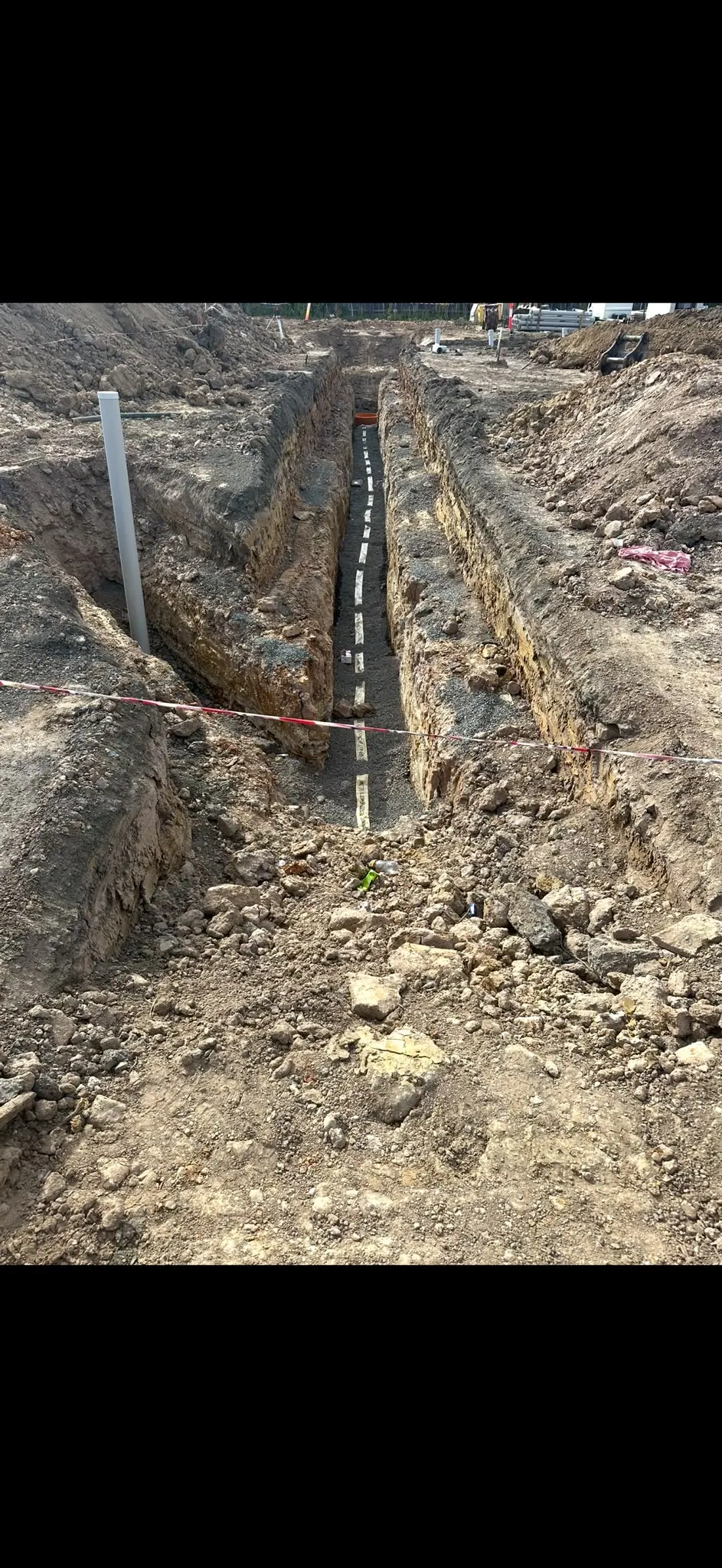 Long service trench with prepared bedding
